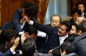 Members of the House of Councillors fighting over a motion to allow Japanese troops to go overseas. Credit: PUCP