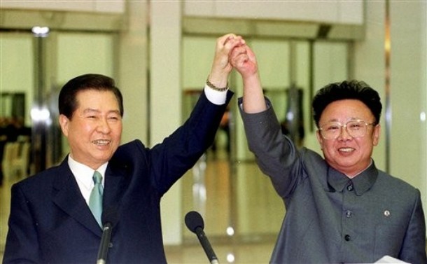 North Korean leader Kim Jong Il, right, and South Korean President Kim Dae-jung sign a joint declaration at a three day summit in Pyongyang on June 14, 2000, as part of Dae-jung's Sunshine Policy  Source: AP Photo/Yonhap, Pool